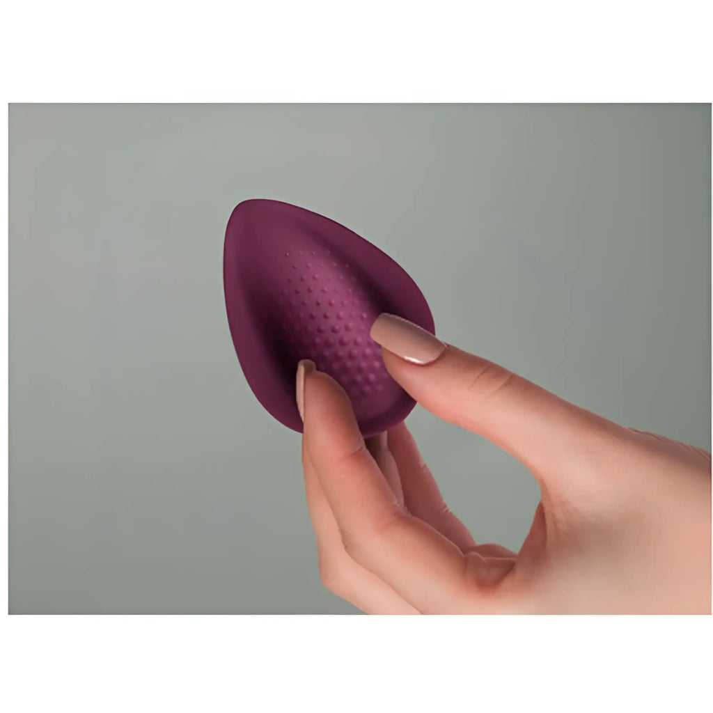 Purple silicone breast form with textured dotted surface featured in rocks off knickerbocker glory panty vibe