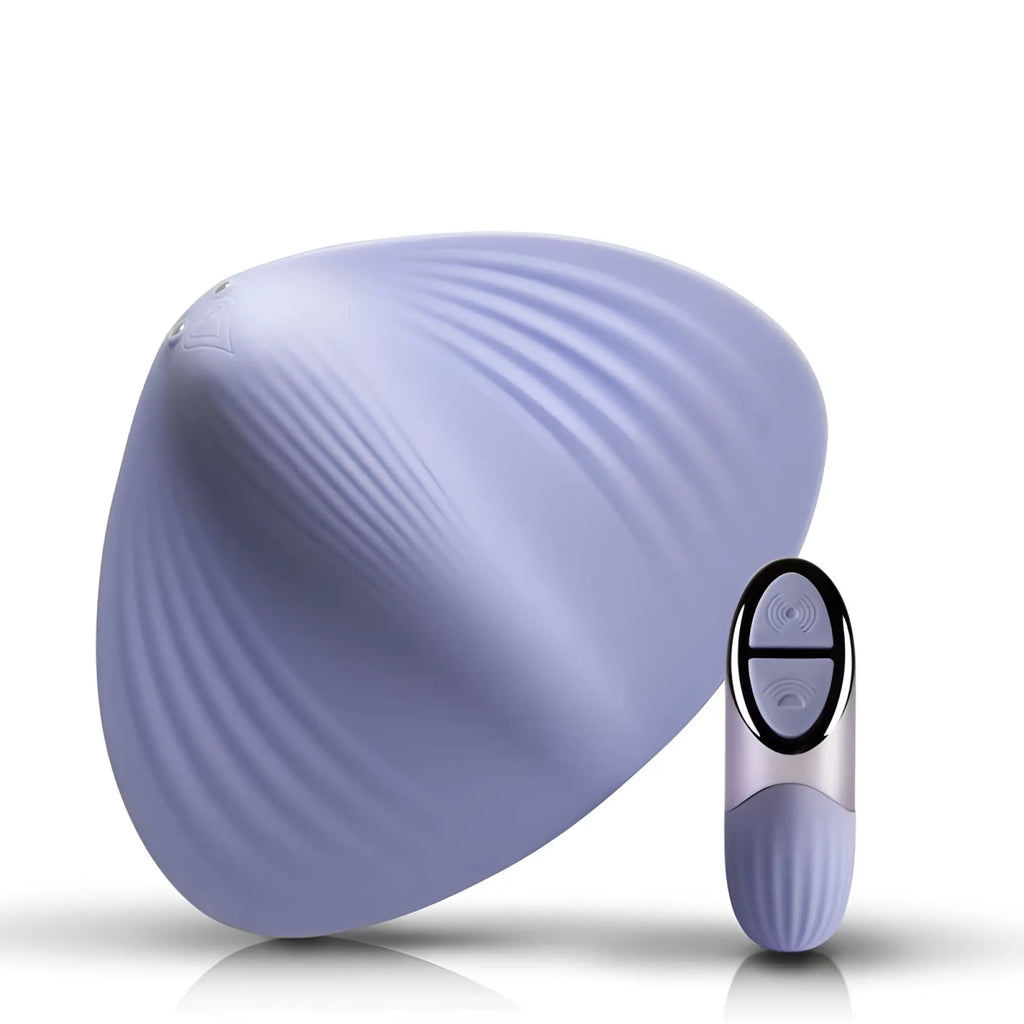 Lavender shell-shaped silicone vibrator with matching remote control rocks off niya 5 rechargeable massager