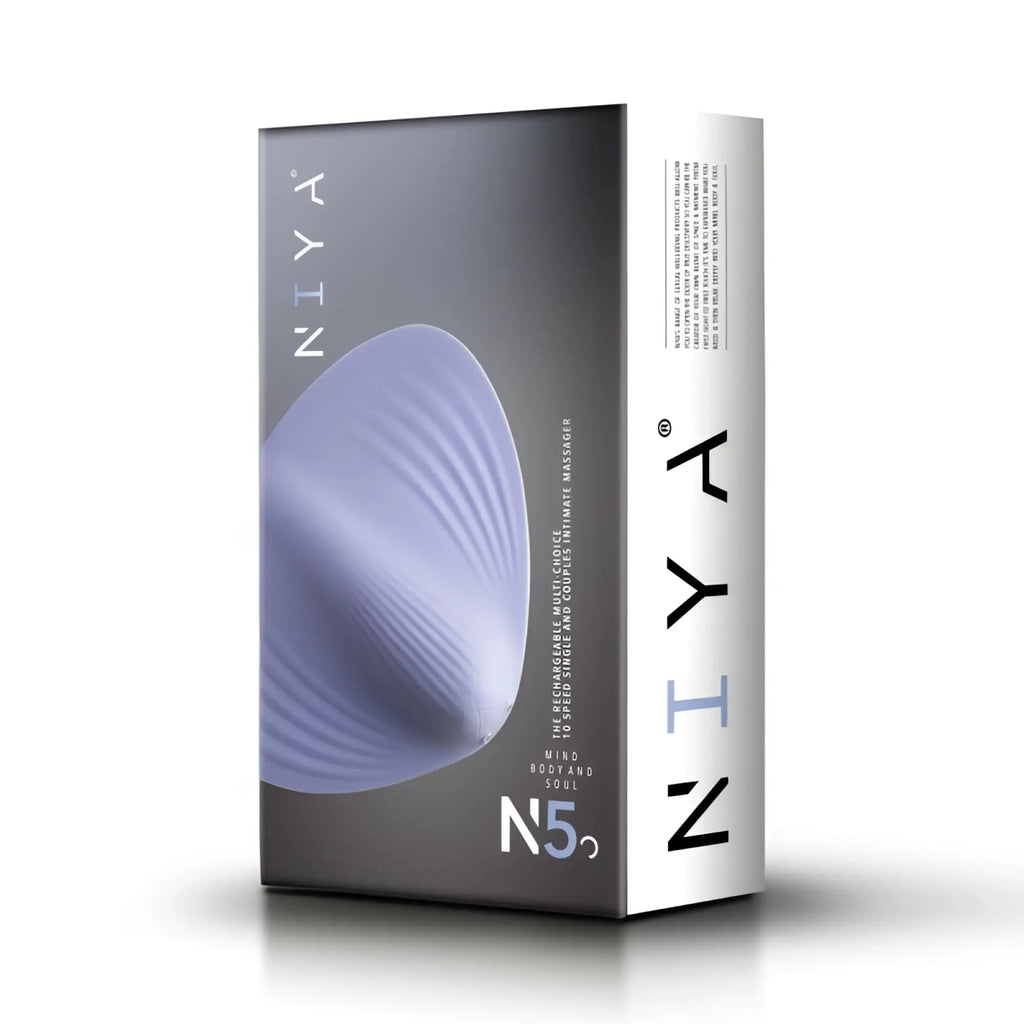 The n52 mind body and soul intimate massager by niya is a sleek lavender silicone rechargeable massager with a ribbed texture