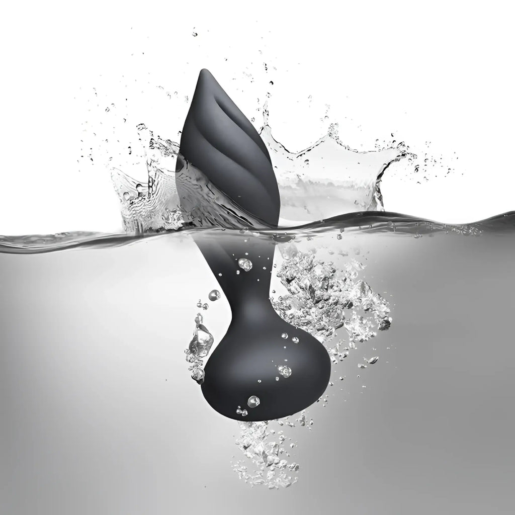 Black silicone anal plug with leaf-shaped tip and smooth rounded body from rocks off petite sensation desire with remote