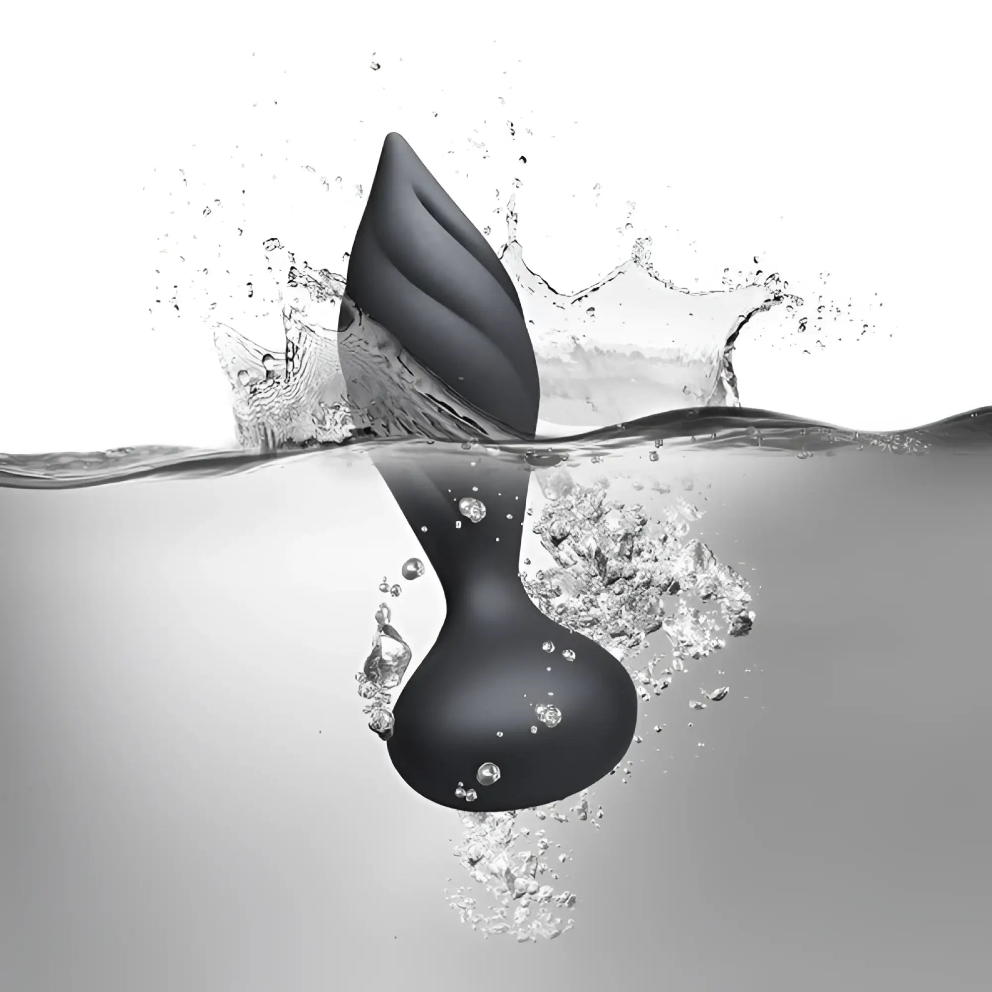 Black silicone anal plug with leaf-shaped tip and smooth rounded body from rocks off petite sensation desire with remote