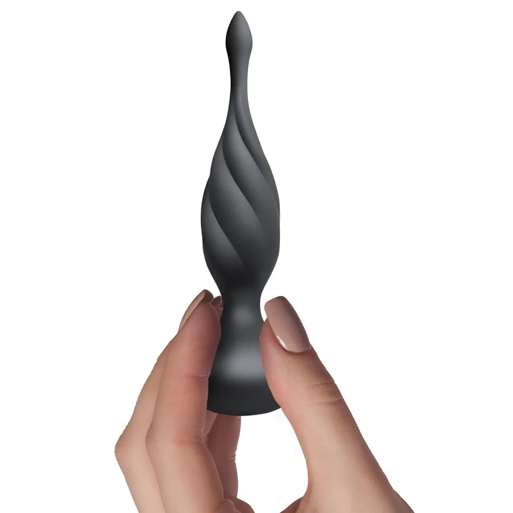 Black silicone anal plug with twisted tapered design from rocks off petite sensation discover butt plug w remote black