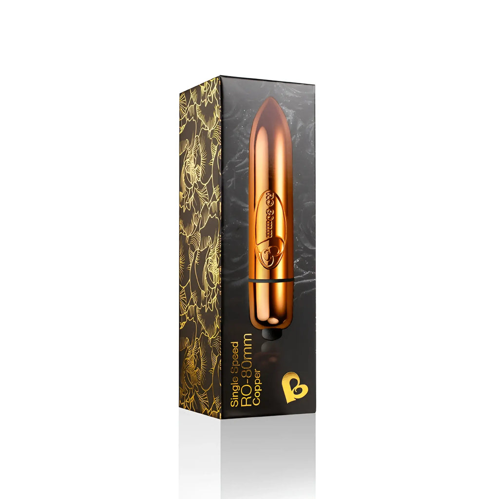 Copper-colored rocks off ro-80 single speed bullet vibrator displayed in sleek black and gold patterned box