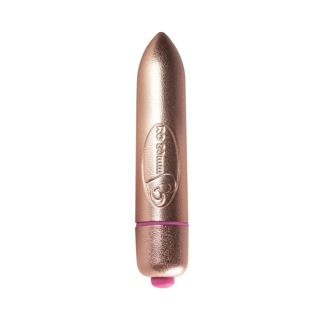 Rose gold metallic cylindrical vibrator with pink tip and embossed logo rocks off ro 80mm 7 speed bullet