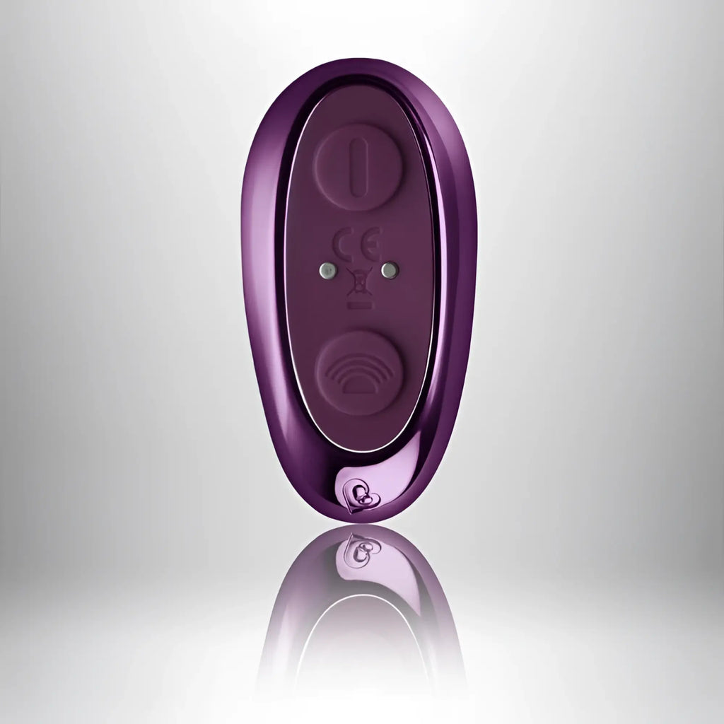Purple metallic rocks off rock chick diva remote control with two circular buttons and glossy finish
