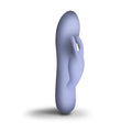 A sleek lavender silicone rabbit vibrator with smooth ergonomic design rocks off sugarboo blissful boo vibe lilac