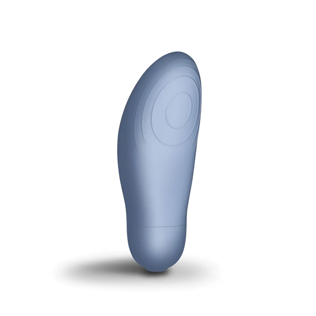 A sleek matte blue silicone rocks off sugarboo blue bae foot-shaped layon massager with subtle concentric grooves