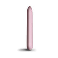 A sleek matte-finish pink cylindrical vibrator with a smooth rounded tip and subtle seam near the base.