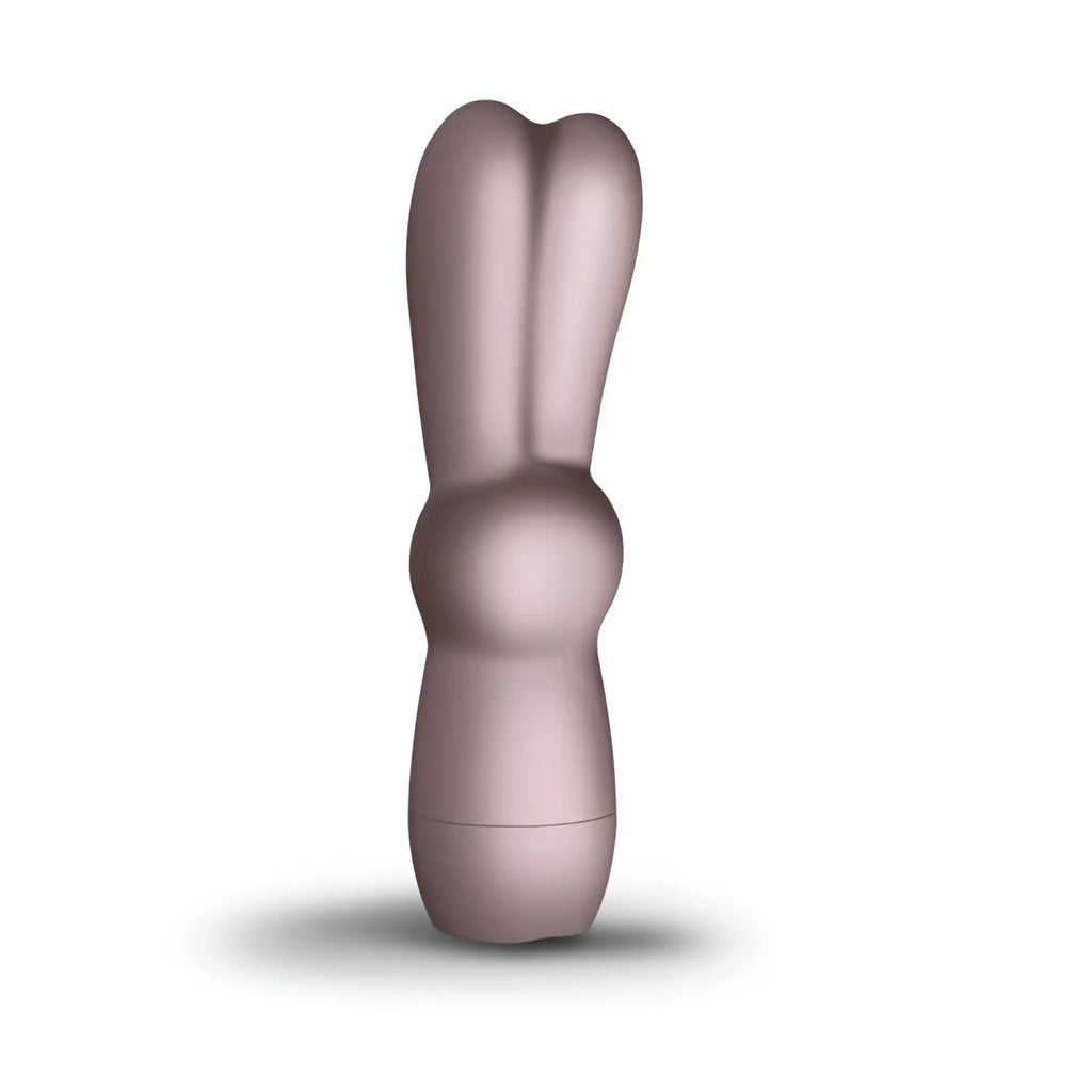A sleek rose gold silicone rabbit vibe with a smooth glossy finish ergonomic bunny design rocks off sugarboo bunnie boo