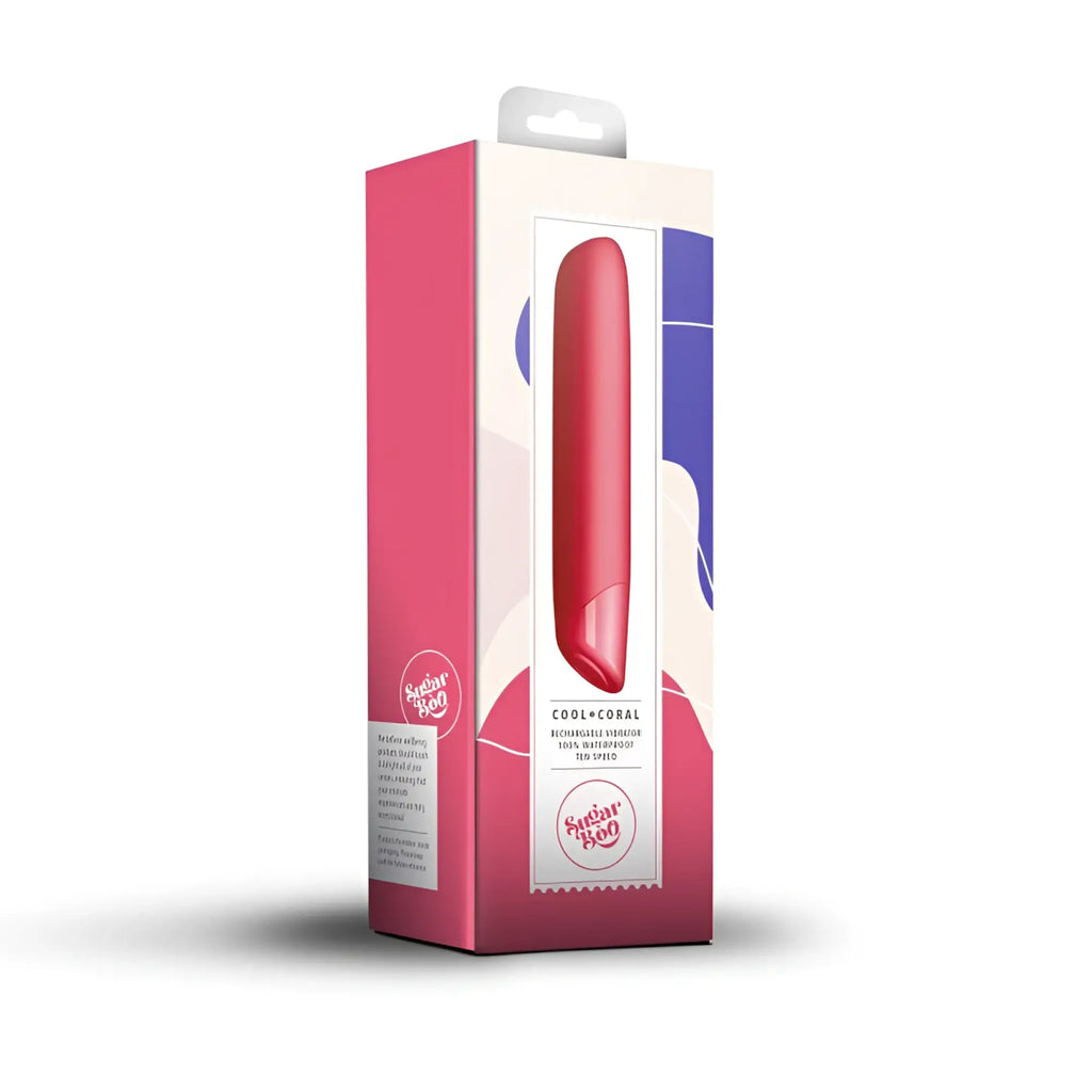 Red coral-colored rechargeable bullet vibrator rocks off sugarboo cool coral in its branded packaging