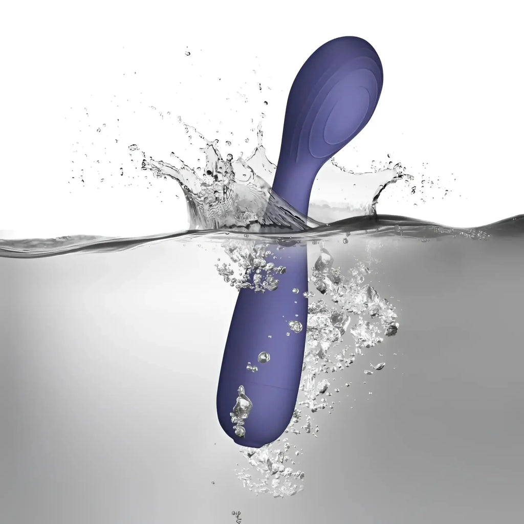 Purple silicone rocks off sugarboo peri berri wand vibe with smooth ergonomic design and rounded handle