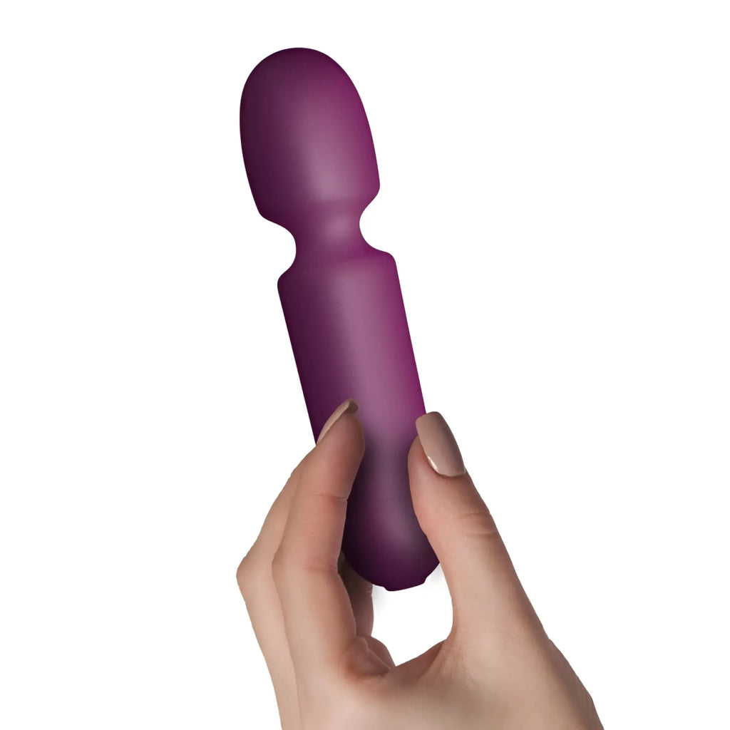 A sleek matte purple silicone wand with a smooth ergonomic design rocks off sugarboo playful passion vibe burgundy
