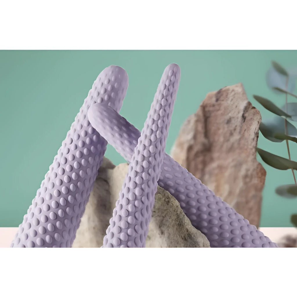 Lavender silicone baby teether with textured bumpy surface from rocks off unite 3 pc silicone dilator set