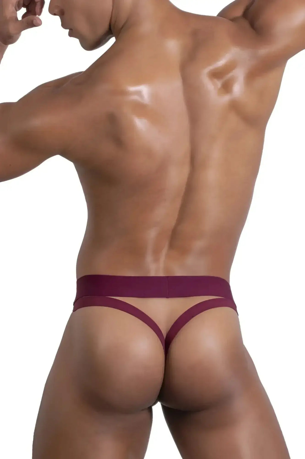 Roger Smuth RS086 jock-thong in burgundy stretchy fabric with wide waistband and thin straps shown from the back