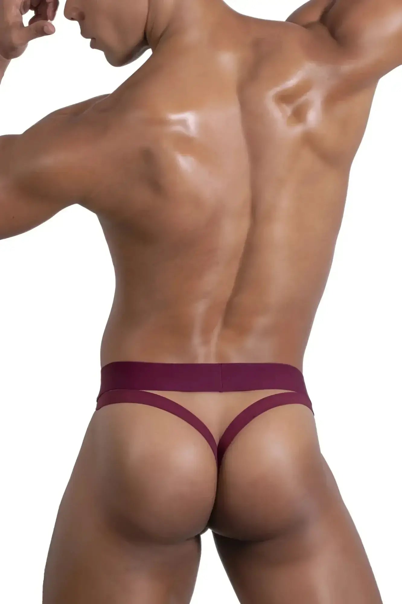 Roger Smuth RS086 jock-thong in burgundy stretchy fabric with wide waistband and thin straps shown from the back
