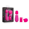 Vibrating pink silicone petite massage wand with interchangeable attachments for targeted massage use