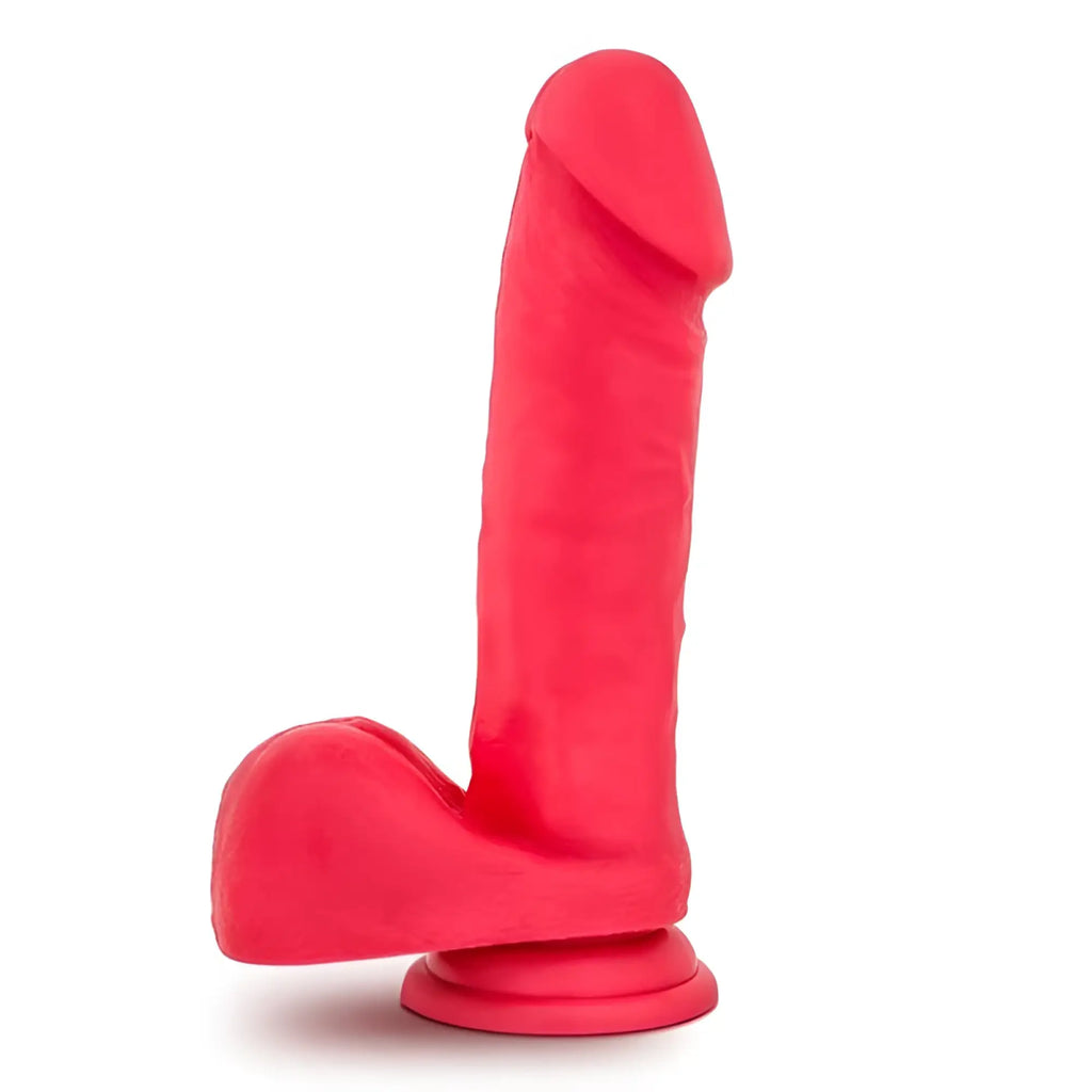 Bright red silicone dildo with rounded head and base in the ruse big poppa cerise dildo product line