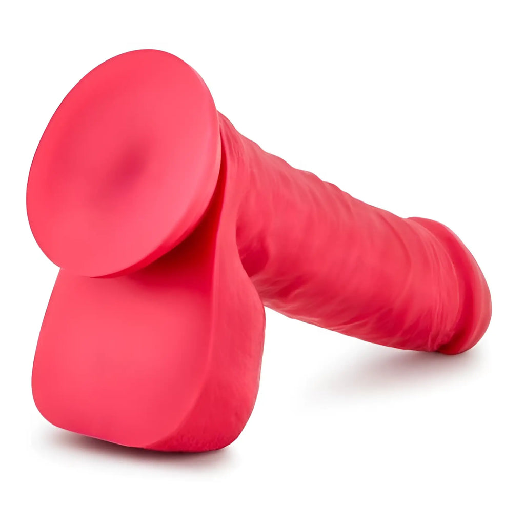 Vibrant pink silicone Ruse Ruse Big Poppa Cerise dildo with textured ribbed shaft and dual rounded suction cups at base