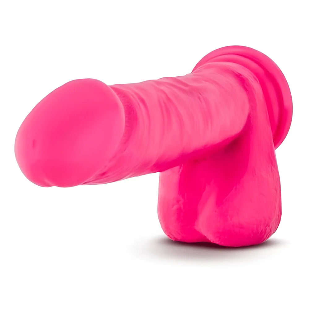 Bright pink silicone dildo with a textured ribbed surface and rounded head from Ruse Big Poppa collection