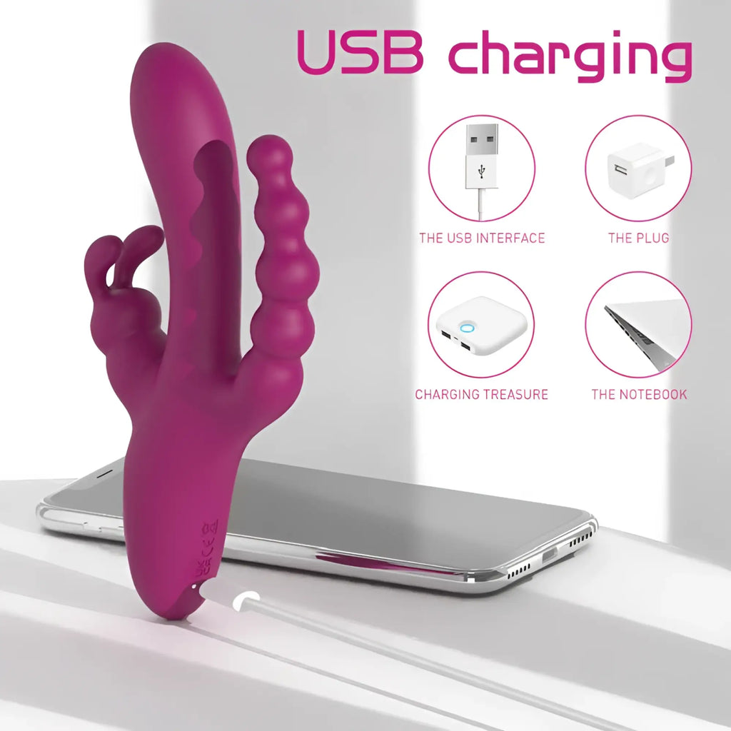 A vibrant magenta silicone s-hande joker triple ecstasy vibrator with textured ridges and a curved handle