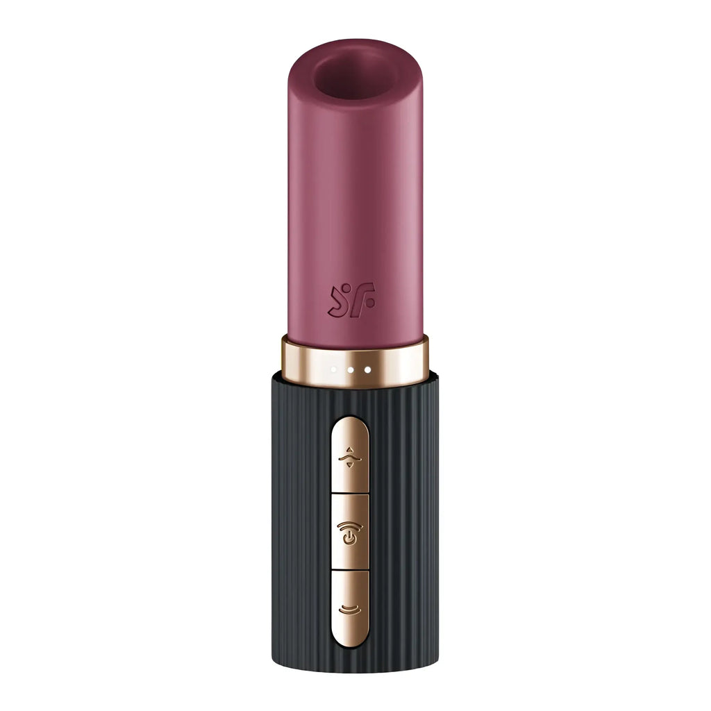 A sleek matte burgundy lipstick with a black ribbed base and gold-tone buttons from satisfyer deep kiss