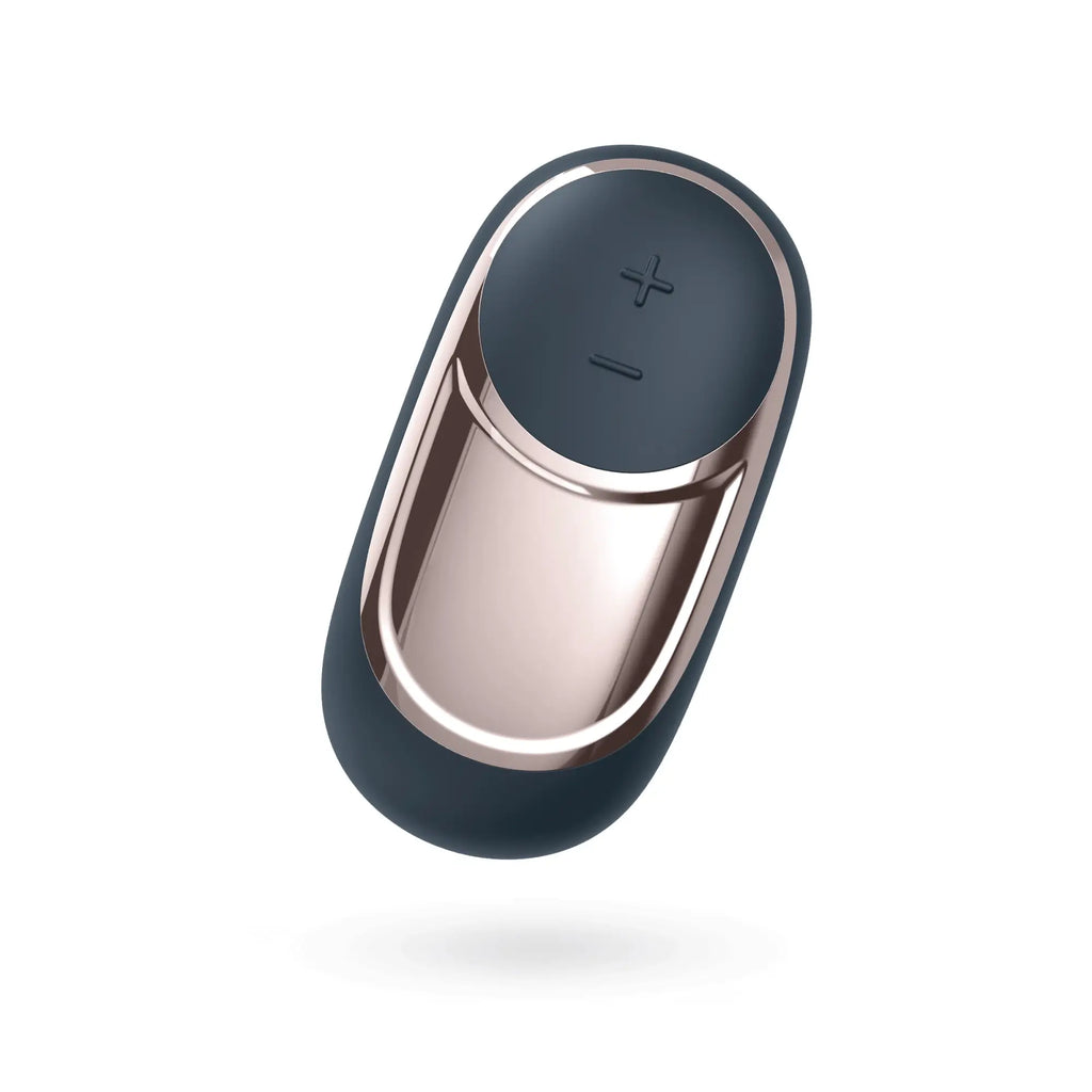 A sleek modern remote control with a dark navy silicone body and rose gold metal accents for satisfyer layon 2 dark desire