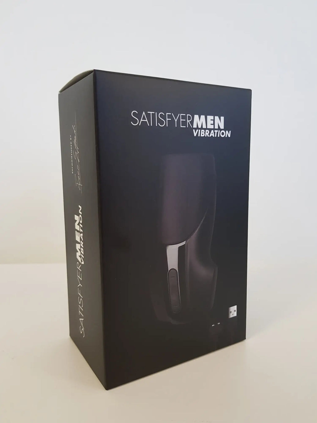 Black satisfyer men vibration device box with sleek modern design and silver accent details for discreet use