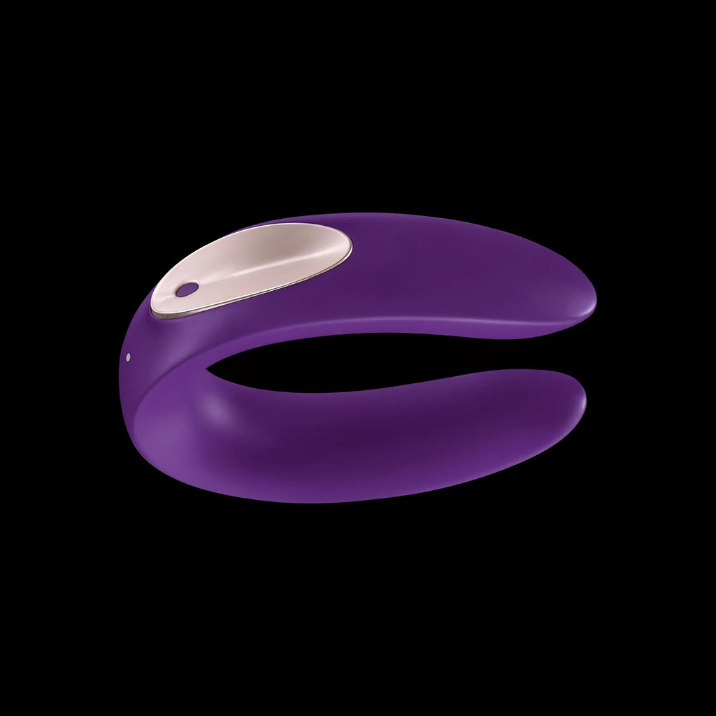 Purple silicone satisfyer partner double plus remote adult toy with silver metallic control panel and circular button