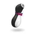 Black and white penguin-shaped adult toy with magenta bow tie from satisfyer for personal pleasure use
