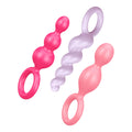 Satisfyer plugs booty call 3 pc silicone anal beads in pink light purple and peach with rings for easy removal