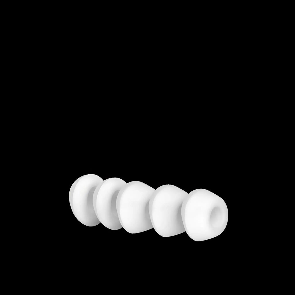 White silicone ear tips for satisfyer pro 2 climax wireless headphones arranged in a row for comfortable fit