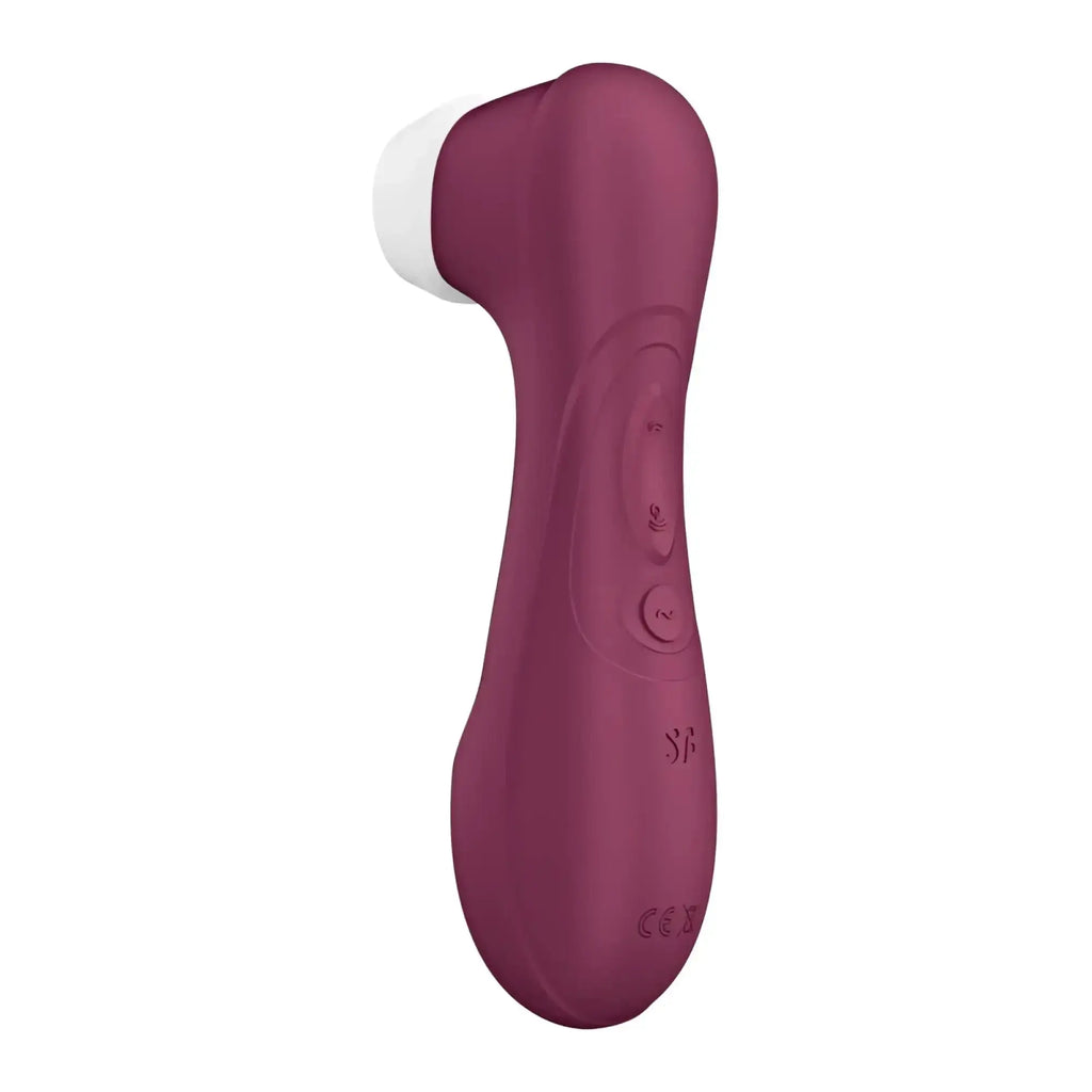 A sleek matte wine red silicone clitoral stimulator wand with a white rounded tip and two control buttons
