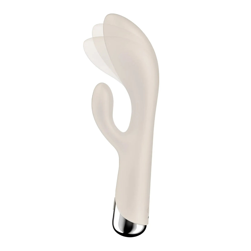 Cream-colored silicone rabbit-shaped vibrator with metallic base from Satisfyer spinning rabbit 1 beige collection