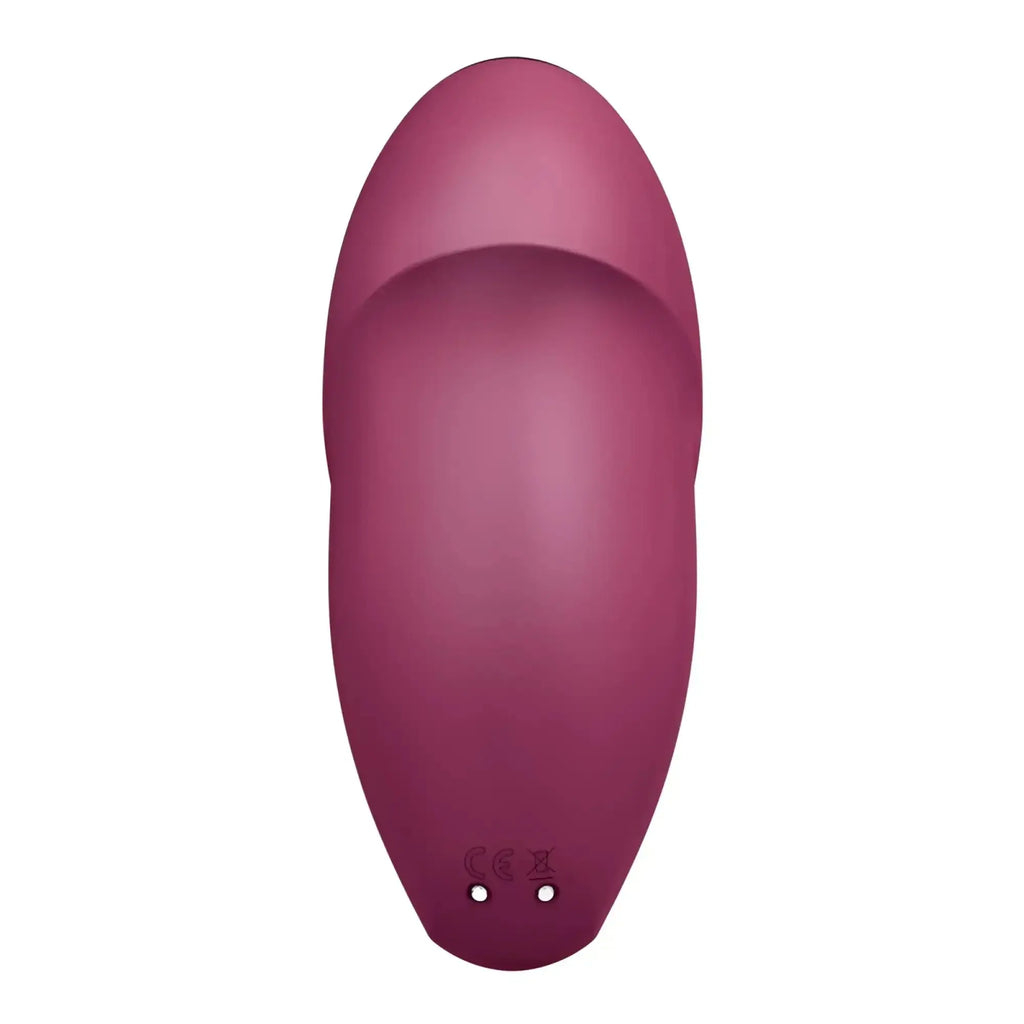 A sleek matte magenta Satisfyer Tap and Climax 1 adult toy with smooth ergonomic design and subtle base branding