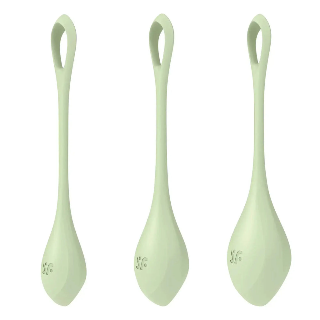Set of three pale green silicone spoons with teardrop shape and looped handles in Satisfyer Yoni Power Balls 2 set