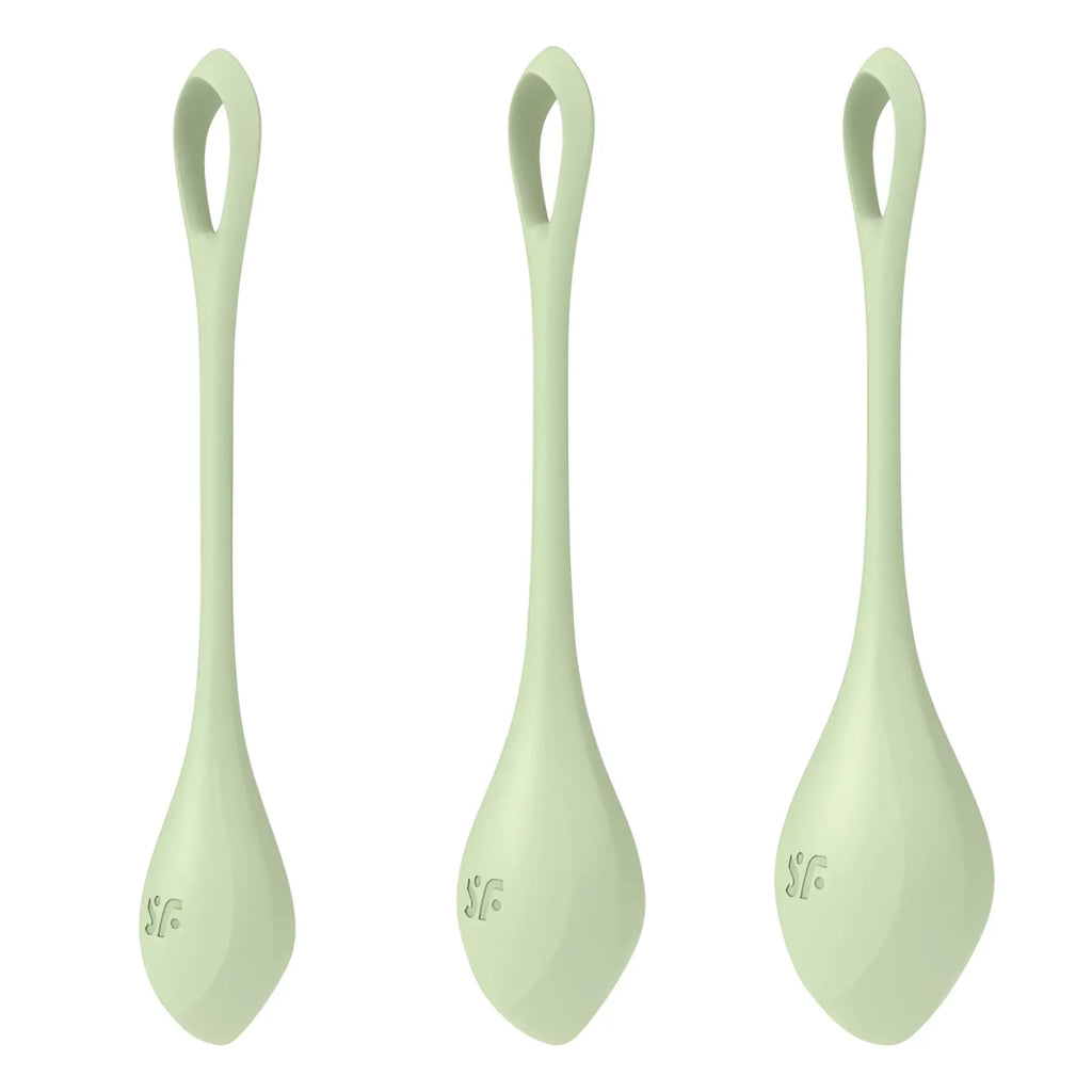Set of three pale green silicone spoons with teardrop shape and looped handles in Satisfyer Yoni Power Balls 2 set