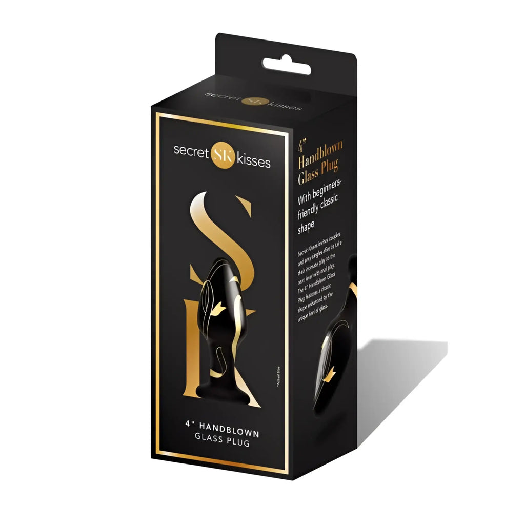 Black handblown glass plug with gold accents in sleek black and gold box from secret kisses 4 inch wide design