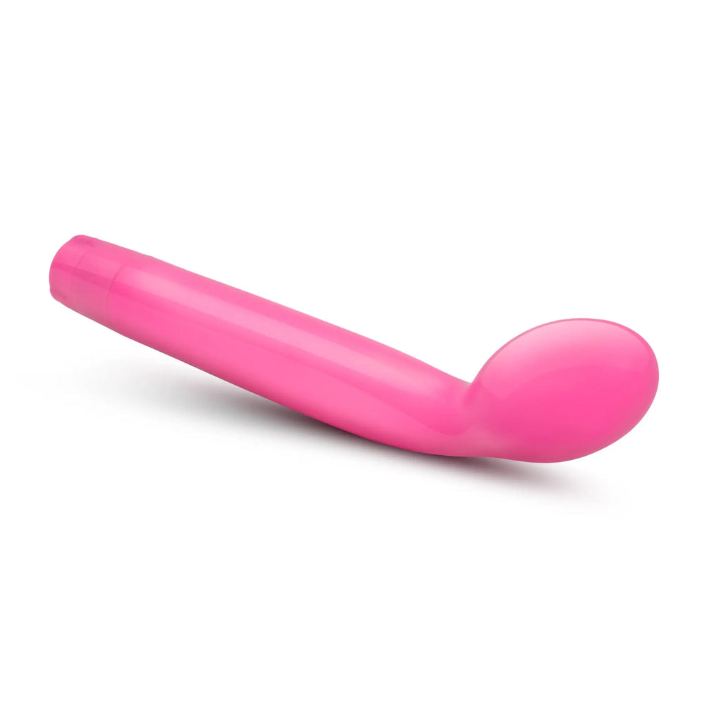 A sleek vibrant pink silicone g slim toy with smooth curved design and rounded tip by sexy things