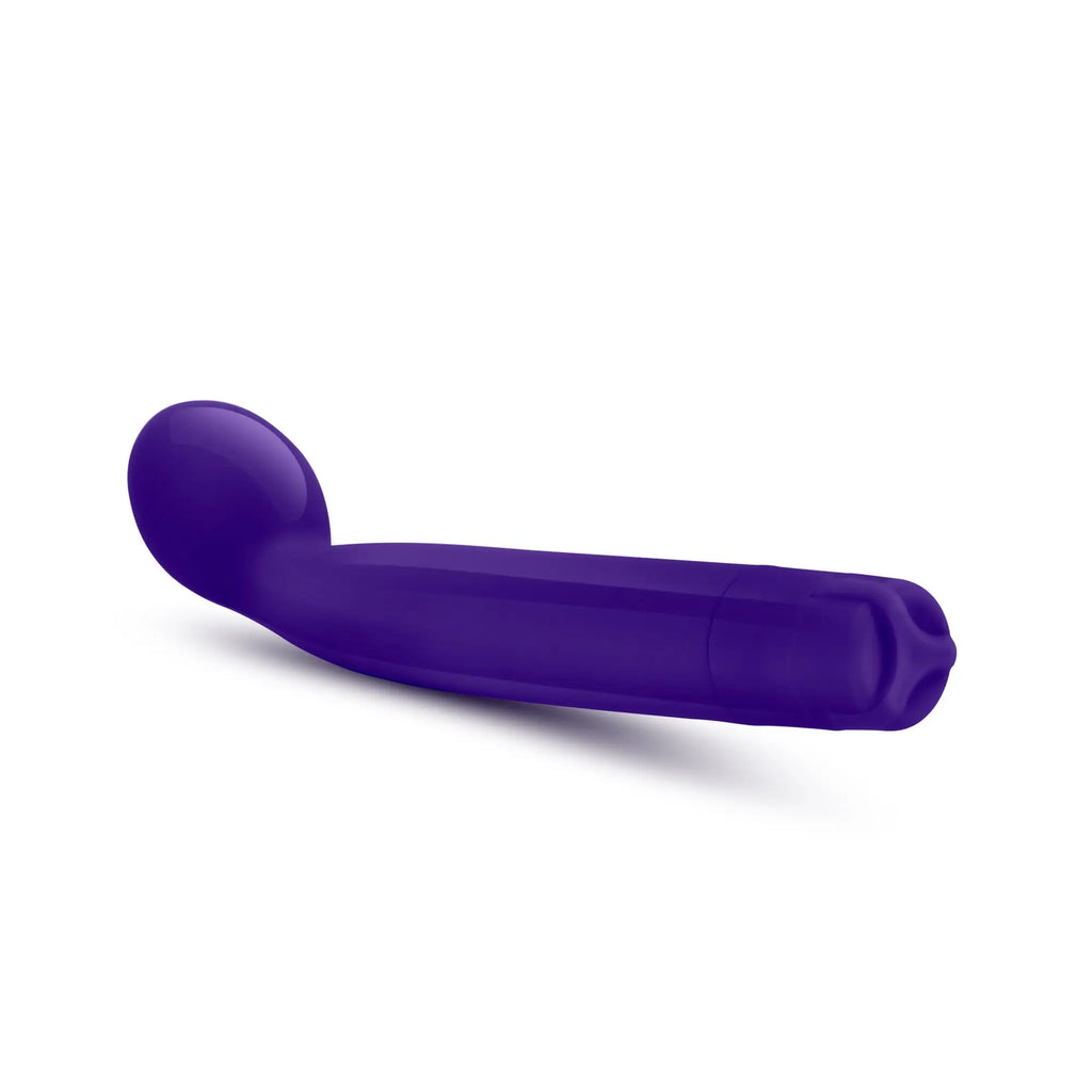 Purple silicone curved vibrator with rounded head and textured grip from sexy things sexy things g slim purple