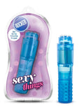 Blue translucent plastic rocker toy with textured grip and clear cylindrical body in pink polka-dot sexy things pack