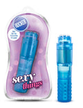 Blue translucent plastic rocker toy with textured grip and clear cylindrical body in pink polka-dot sexy things pack