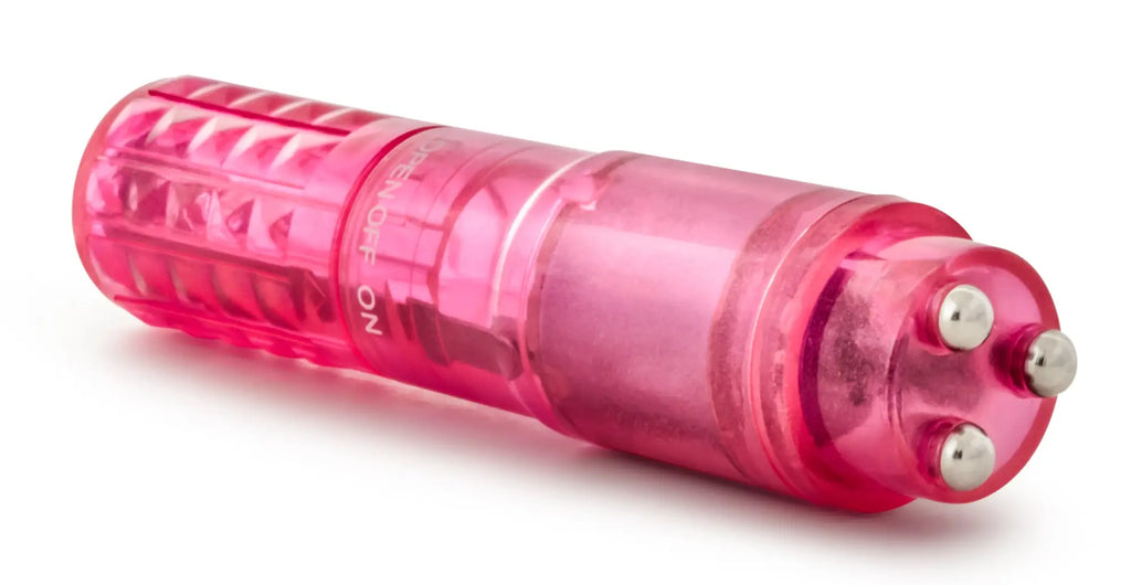 Pink translucent plastic sexy things rocker with three metallic spheres and textured grip for massage use