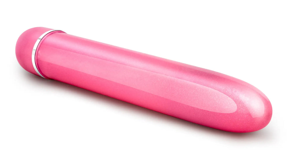 Sexy Things Slimline Vibe Pink cylindrical vibrator with smooth glossy finish and silver metallic band near rounded end