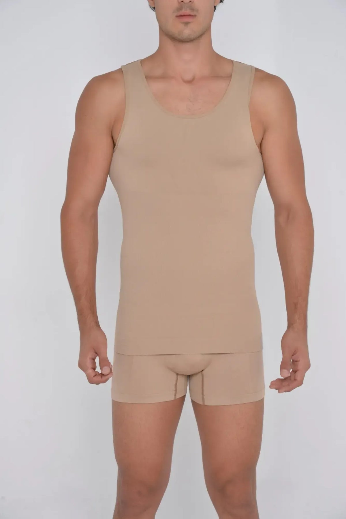 Beige seamless shaper tank top with matching briefs designed for comfortable shaping and smooth fit