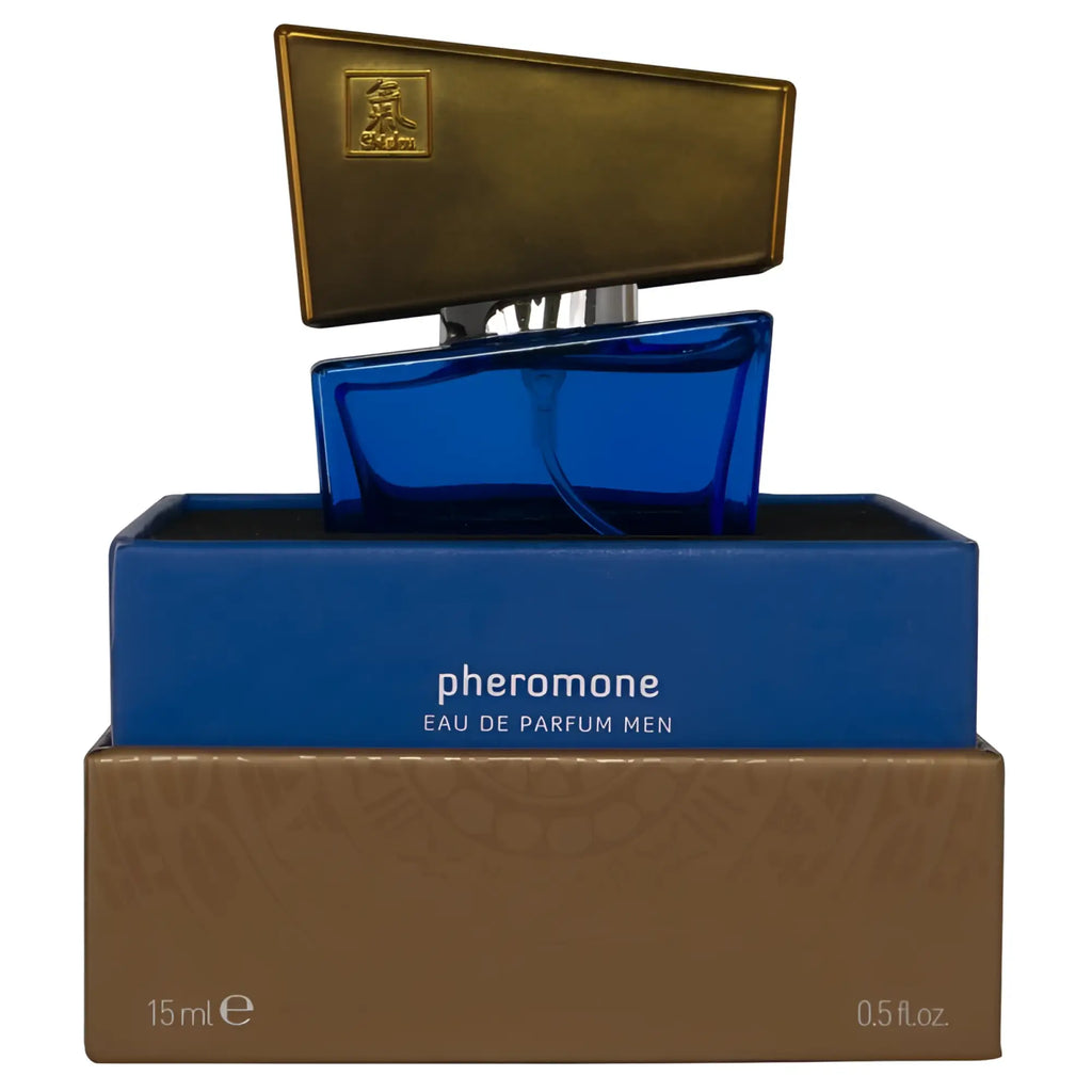 Blue glass Shiatsu pheromone fragrance bottle for men with gold-toned cap in branded dark blue packaging 15ml