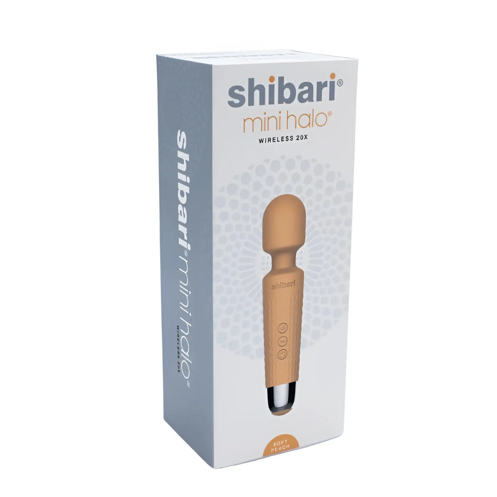 The shibari mini wand halo 20x peach is a sleek silicone wand with three buttons and a metallic tip