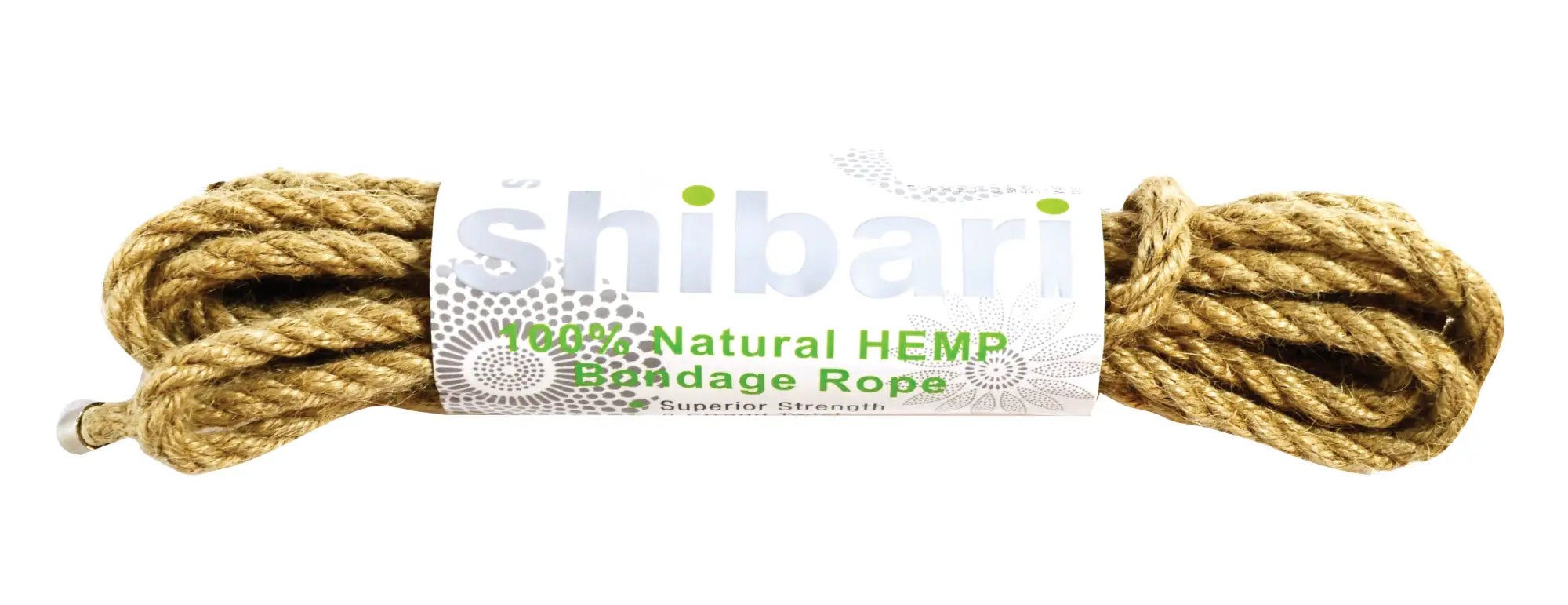 A coiled beige shibari rope made of 100 percent natural hemp with a white and green label for bondage use