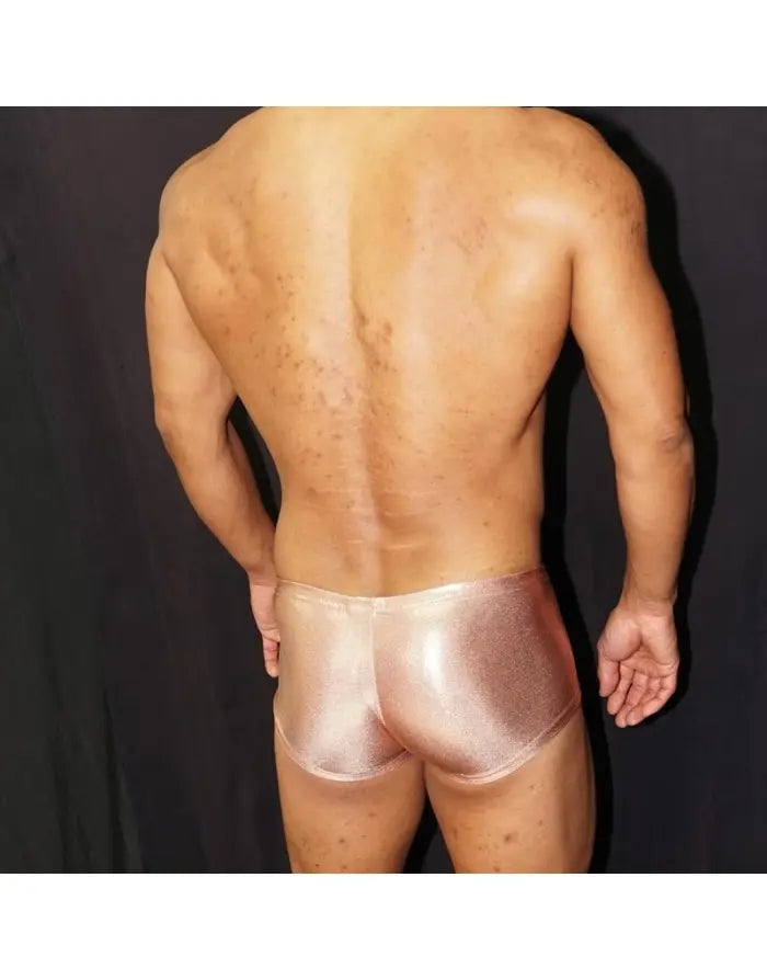 Shiny copper men's boxer underwear by Arroyman featuring a snug fit and smooth material shown from the back.