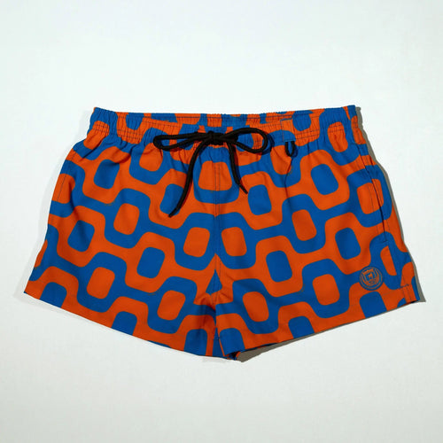 Orange and blue geometric-print swim shorts with a dark drawstring.