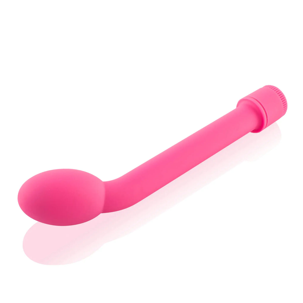 Pink silicone curved vibrator with rounded head and textured grip si novelties curved g spot massager pink